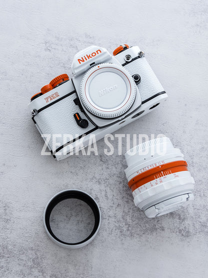 Nikon FM2 w/ 50mm f/1.4 Lens [White Orange Repaint]