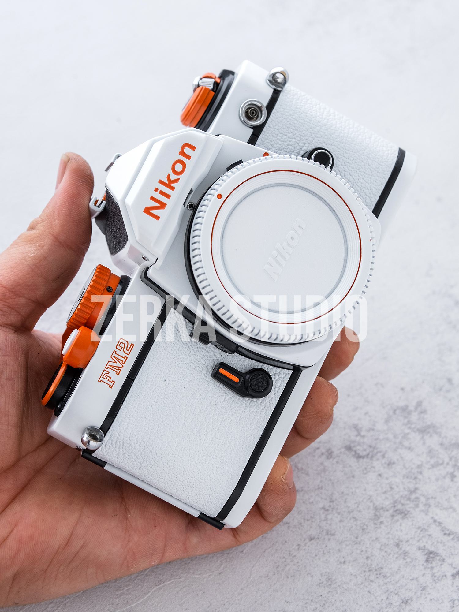 Nikon FM2 w/ 50mm f/1.4 Lens [White Orange Repaint]