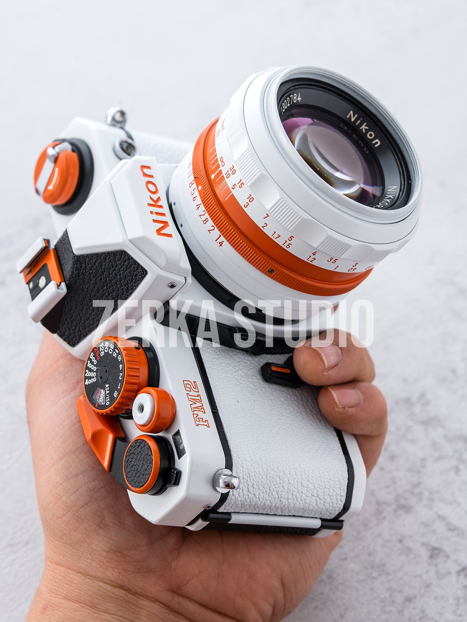 Nikon FM2 w/ 50mm f/1.4 Lens [White Orange Repaint]