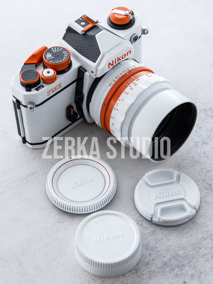 Nikon FM2 w/ 50mm f/1.4 Lens [White Orange Repaint]