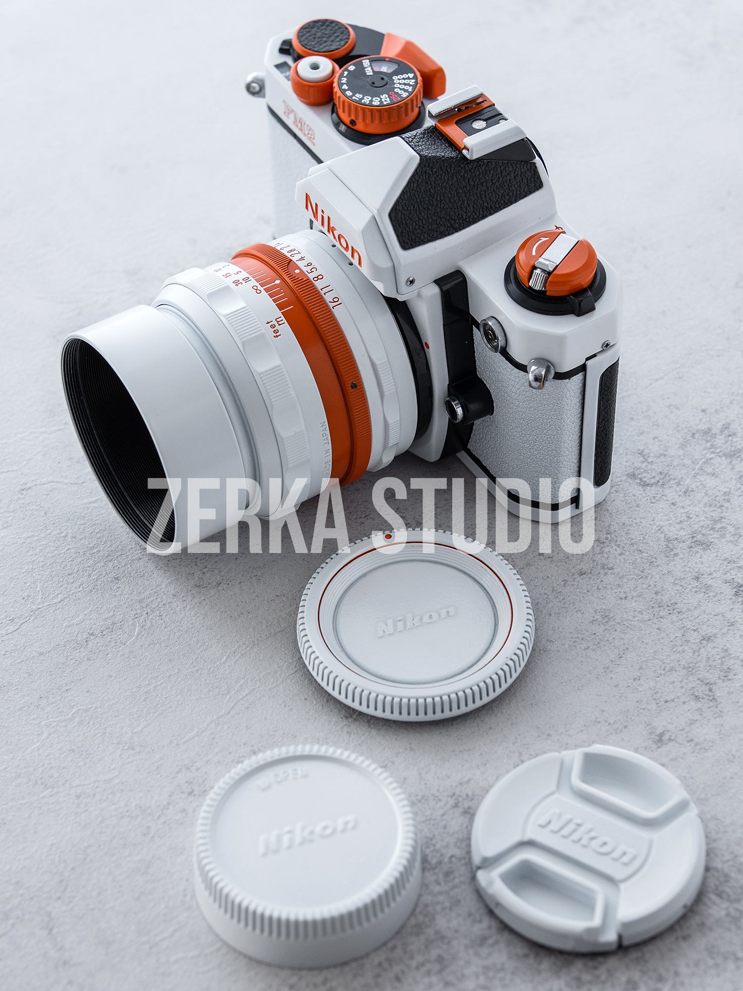 Nikon FM2 w/ 50mm f/1.4 Lens [White Orange Repaint]