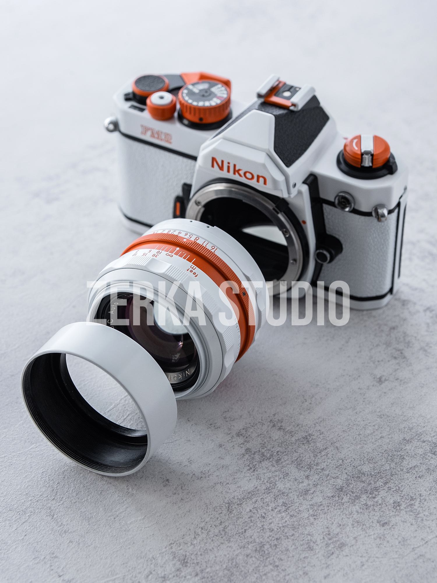 Nikon FM2 w/ 50mm f/1.4 Lens [White Orange Repaint]