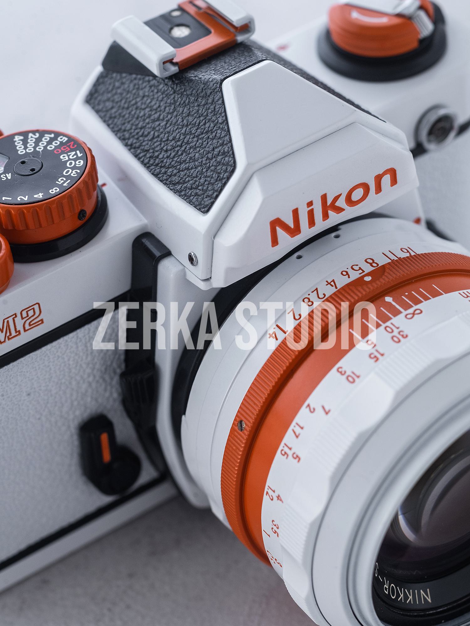 Nikon FM2 w/ 50mm f/1.4 Lens [White Orange Repaint]