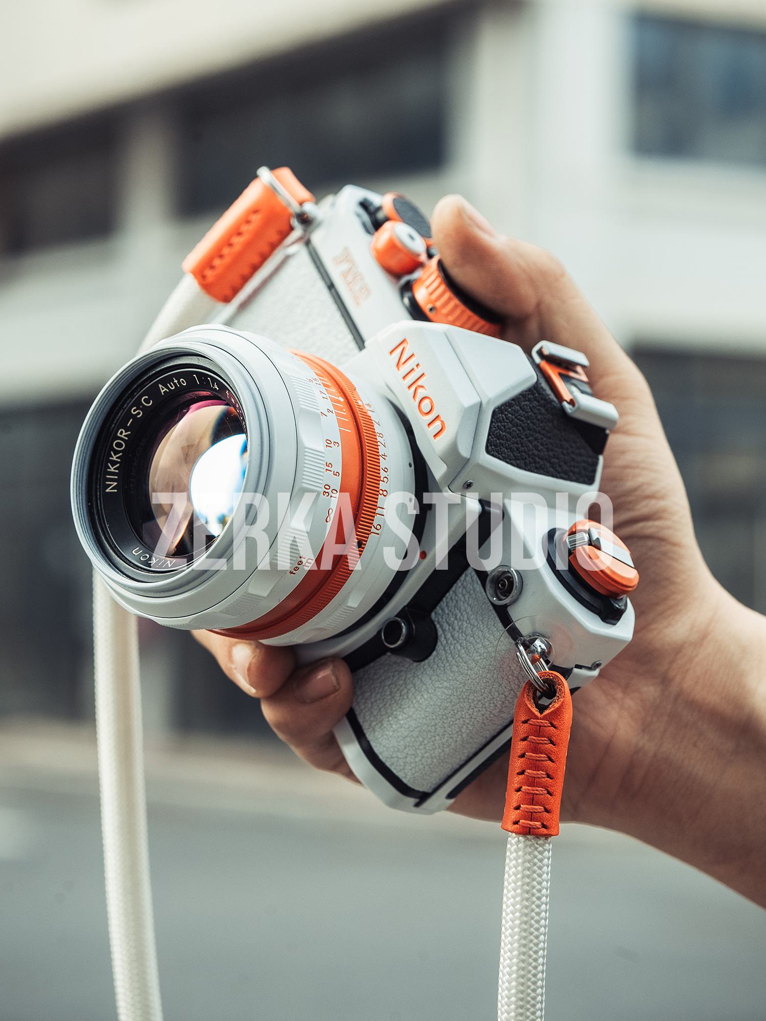 Nikon FM2 w/ 50mm f/1.4 Lens [White Orange Repaint]