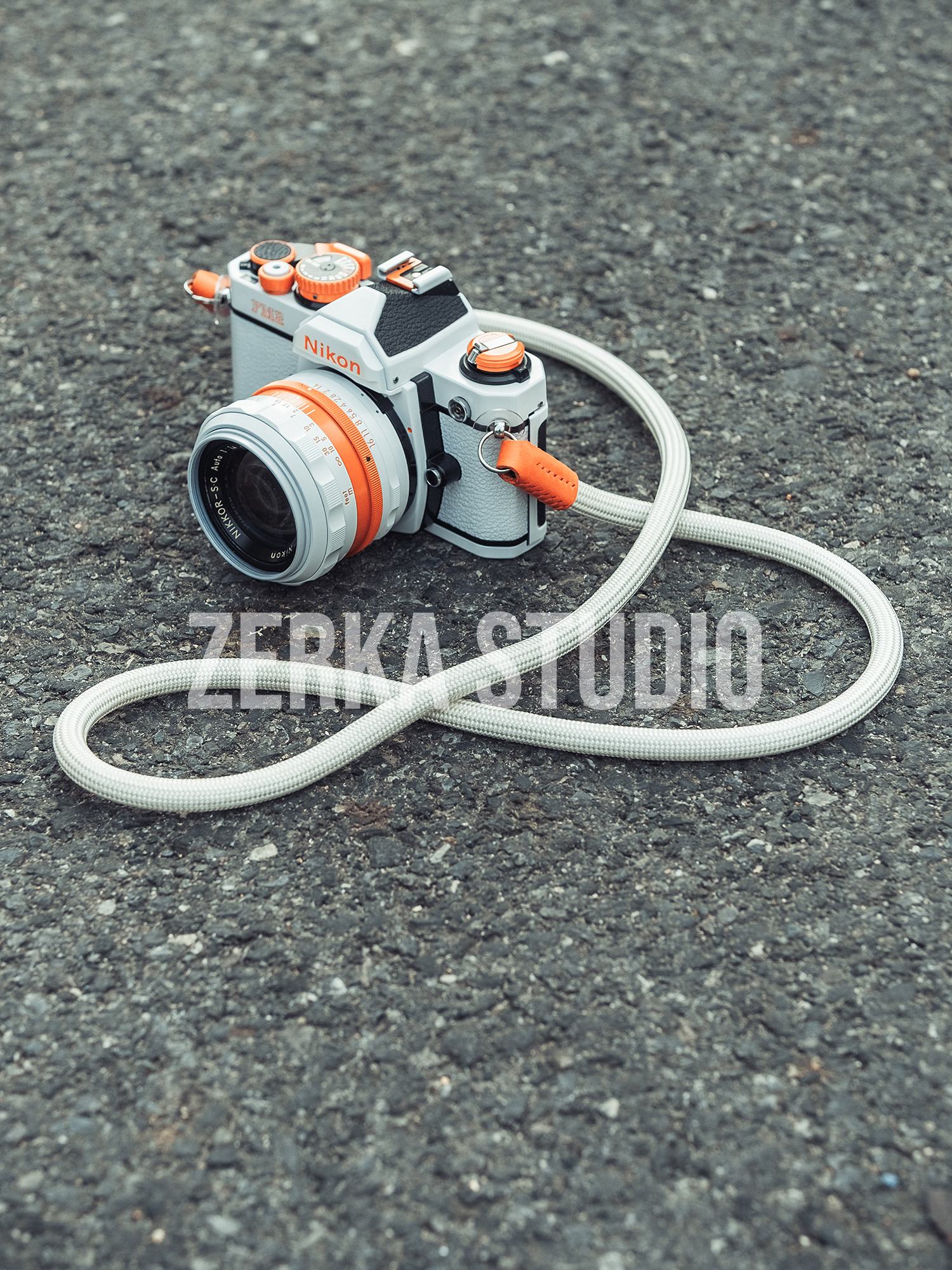 Nikon FM2 w/ 50mm f/1.4 Lens [White Orange Repaint]