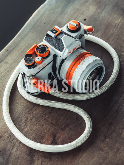 Nikon FM2 w/ 50mm f/1.4 Lens [White Orange Repaint]